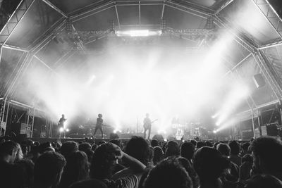 People enjoying music concert