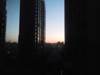 Road against clear sky during sunset