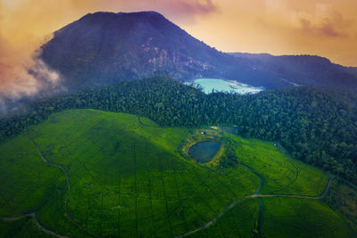 Scenic view of landscape against sky during sunset