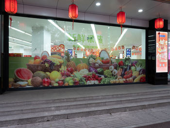 Flower pots on window sill at store