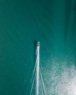 Aerial view of boat sailing on sea