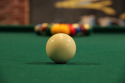 Close-up of ball on pool table