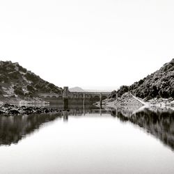 View of calm lake against clear sky