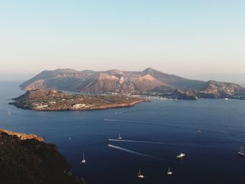 High angle view of bay against clear sky