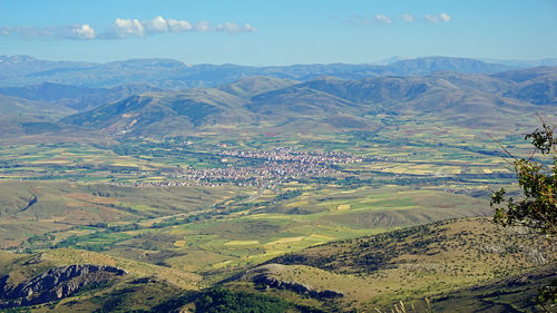 Aerial view of agricultural landscape against sky