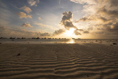 Scenic view of beach during sunset