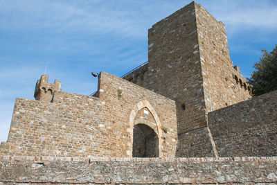 Ancient medieval gate of the defensive walls of the fortress of montalcino in tuscany