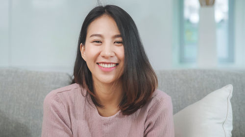 Portrait of a smiling young woman