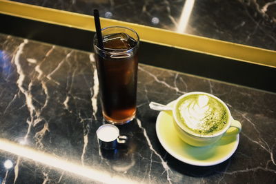 High angle view of drinks on table