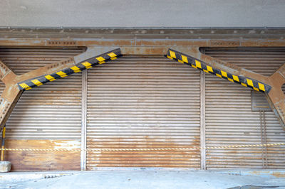 View of yellow flag on wall