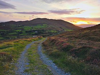 Scenic view of landscape against sky during sunset