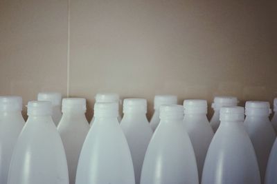 Close-up of white bottles