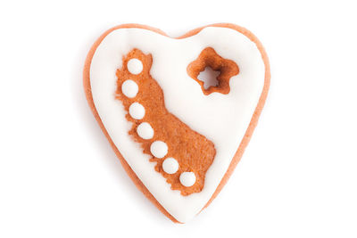 Close-up of heart shape cookies on white background