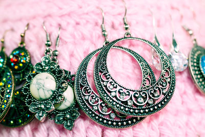 Silver hoop earrings and precious stones . traditional balkan jewelry