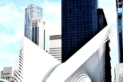 Low angle view of modern building against sky