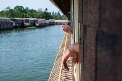 Man by rope on boat