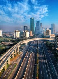 High angle view of highway in city against sky