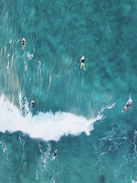 High angle view of man surfing in sea