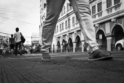 People in front of buildings