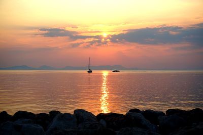 Scenic view of sea at sunset