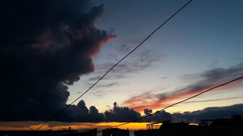 Low angle view of vapor trails in sky