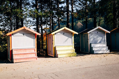 View of beach hut against trees