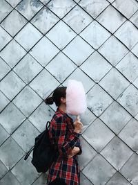 Woman holding cotton candy