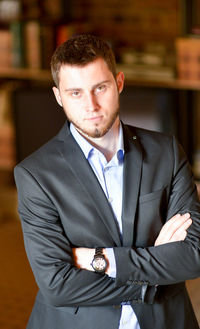 Portrait of confident businessman at office