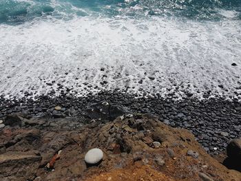 High angle view of rocks on beach