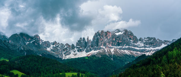 Panoramic view of the rosengarten group mountain massif in the dolomites in south tyrol, italy.