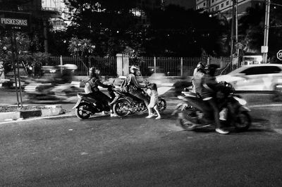 Bicycles parked on street in city