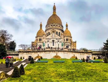 View of temple against cloudy sky