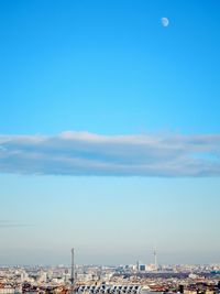 Cityscape against blue sky