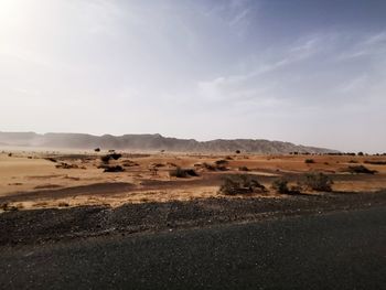 Scenic view of desert against sky