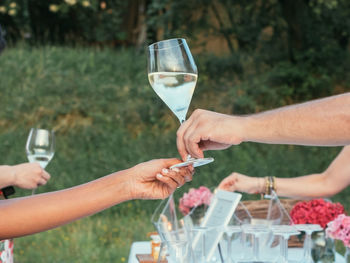 Close-up of hands holding drink