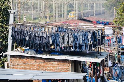 Clothes drying on roof against building