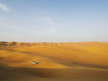 High angle view of tent at desert against sky