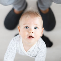 Portrait of cute baby boy at home