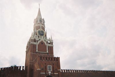 Low angle view of clock tower against sky