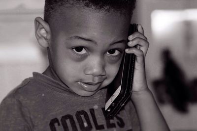 Close-up portrait of boy at home