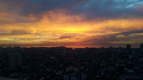 Aerial view of city at dusk