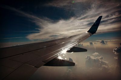 Cropped image of airplane wing