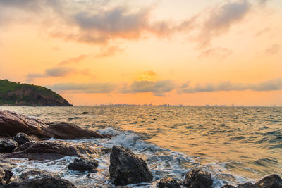 Scenic view of sea against sky during sunset