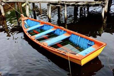 High angle view of boat moored in water