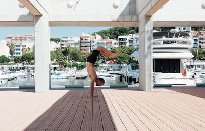 Sportsman practicing stretching and calisthenics