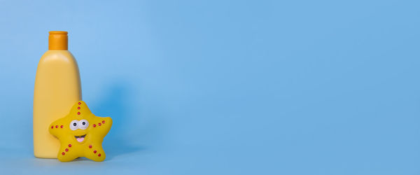 Close-up of dices against blue background