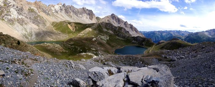 Panoramic view of rocky mountains against sky