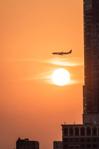 Silhouette of buildings at sunset