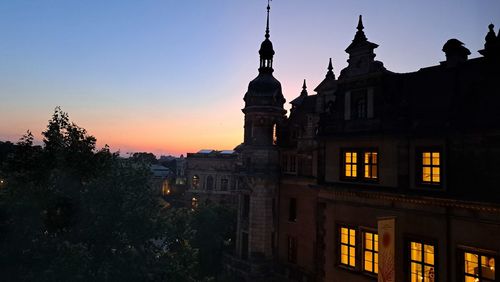 Low angle view of church against sky during sunset