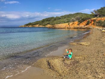 Scenic view of beach against sky